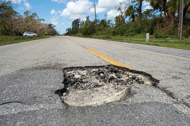 Как прицеп с термос бункером может помочь вам справиться с зимними выбоинами на асфальте