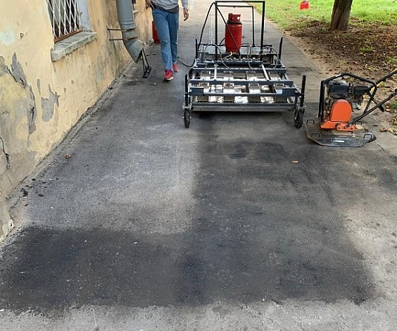 Инфракрасный разогрев остывшего асфальта на месте проведения работ